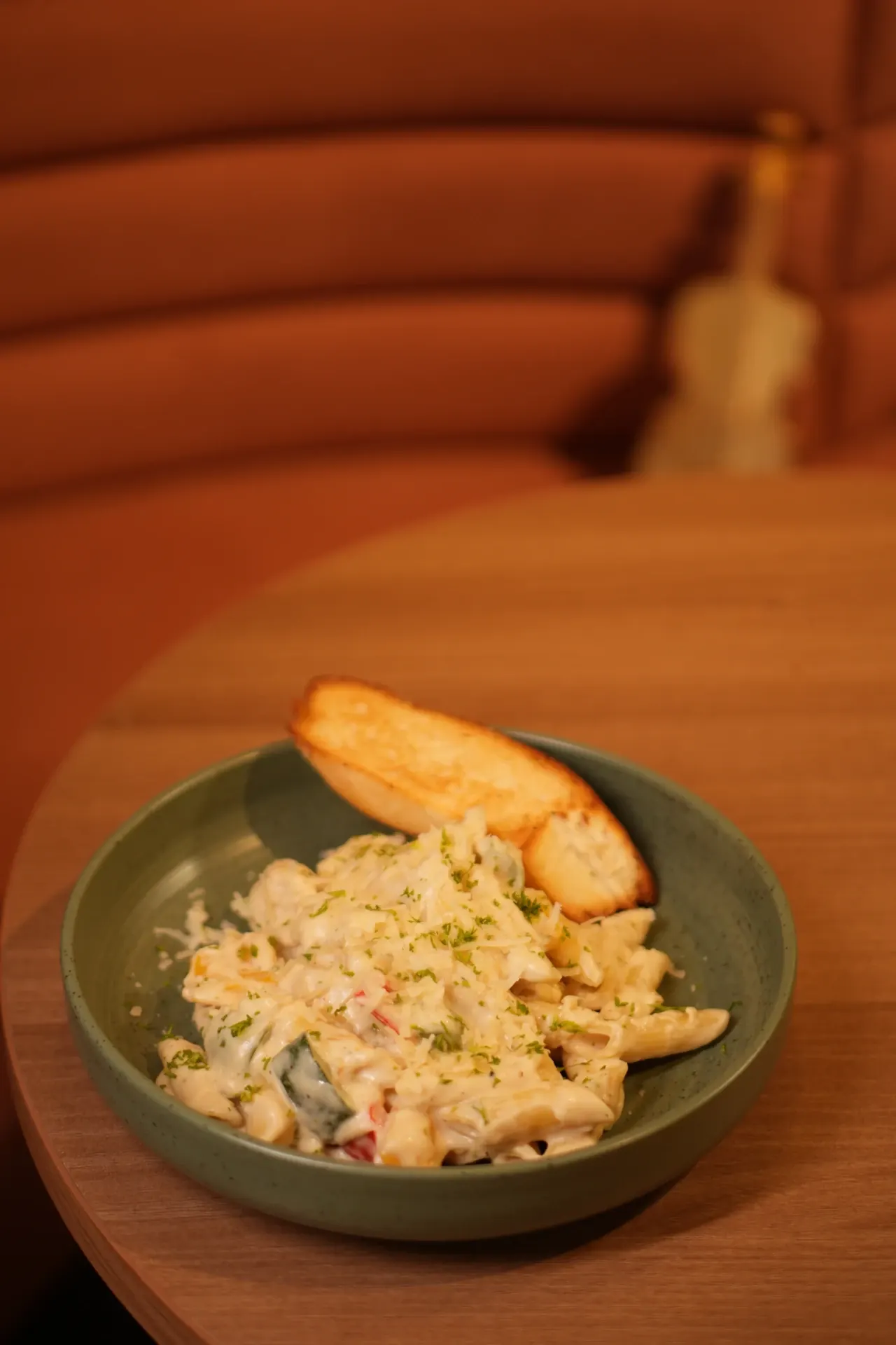 Comfort by the Bowl - Creamy penne pasta finished with herbs and served with toasted bread.