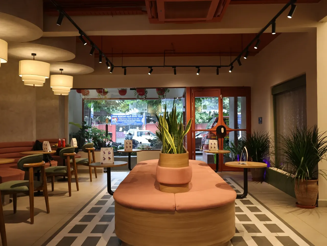 The central seating area inside a Kora.Blr café